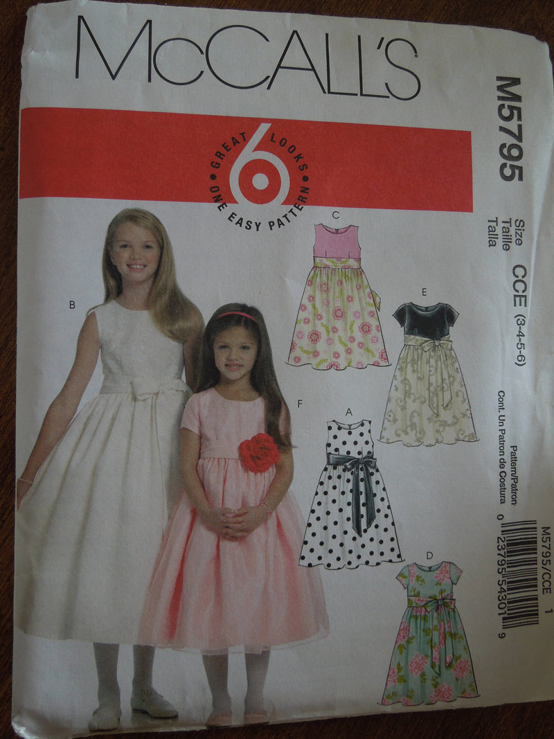 McCalls M5795, Girls, Dresses with Sash, Sizes Vary,  UNCUT sewing pattern,